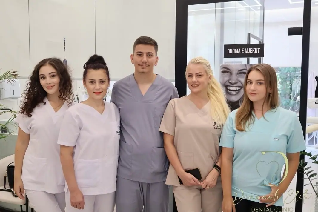 Dr Sonila and Dr Joana Prifti with the clinic team